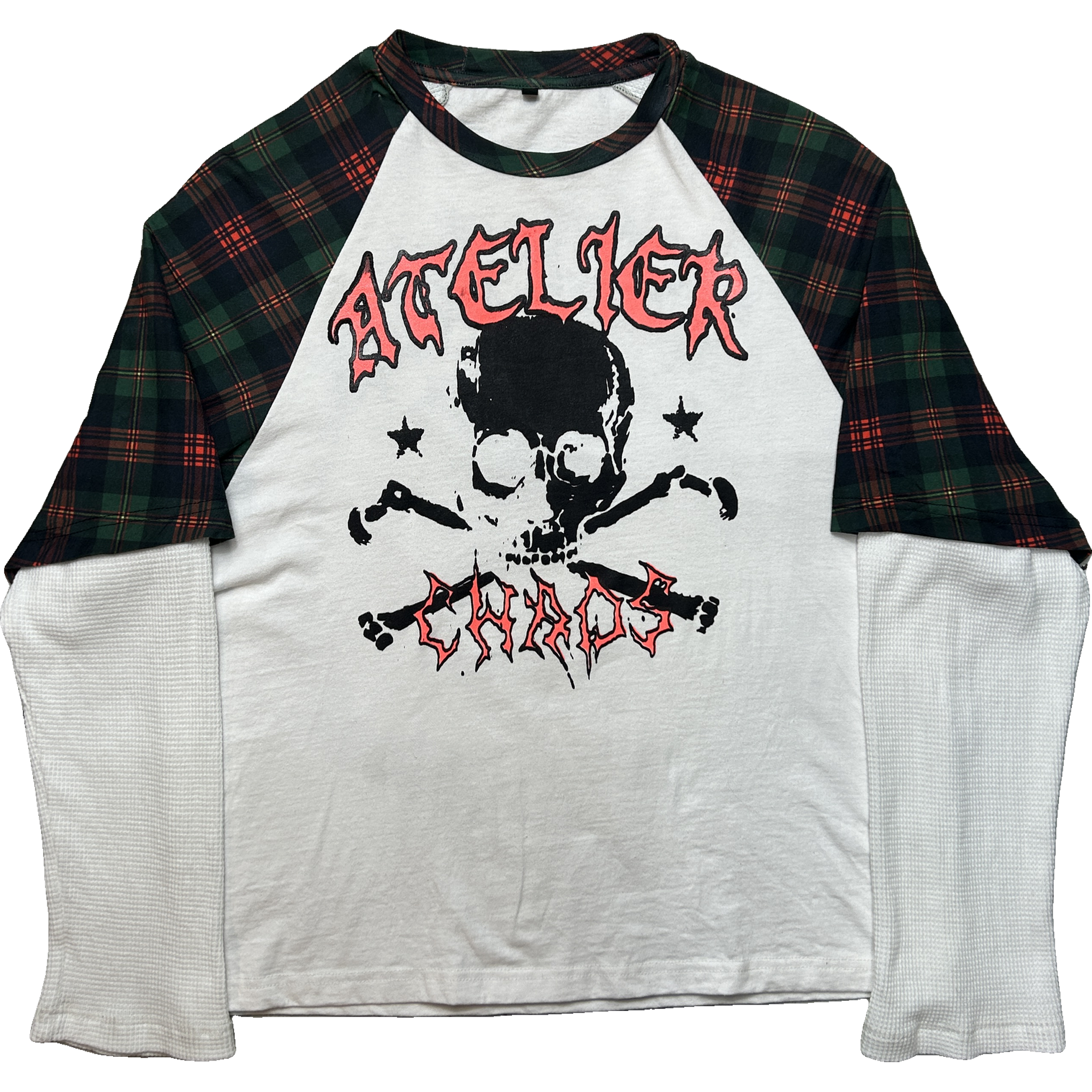 A raglan baseball-style shirt laid flat on a white background. The torso is white, with dark green plaid sleeves and a large front graphic featuring a black skull-and-crossbones design, red text, and black/red lettering.